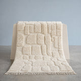 Tapis Beni Ouarain Tazult — laine épaisse ivoire à motifs géométriques, tissé main Haut Atlas
